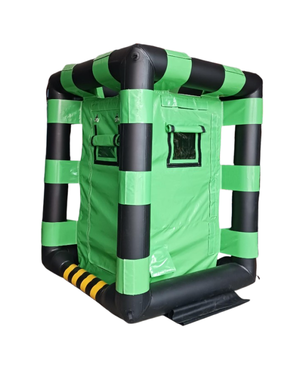 Decontamination Shower, made from UV stable, chemical resistant, and flame retardant wipe-clean PVC. Cuboid in shape, with black plato beams supporting it's structure. There are windows on the doors, and black / yellow chevron stripes. 